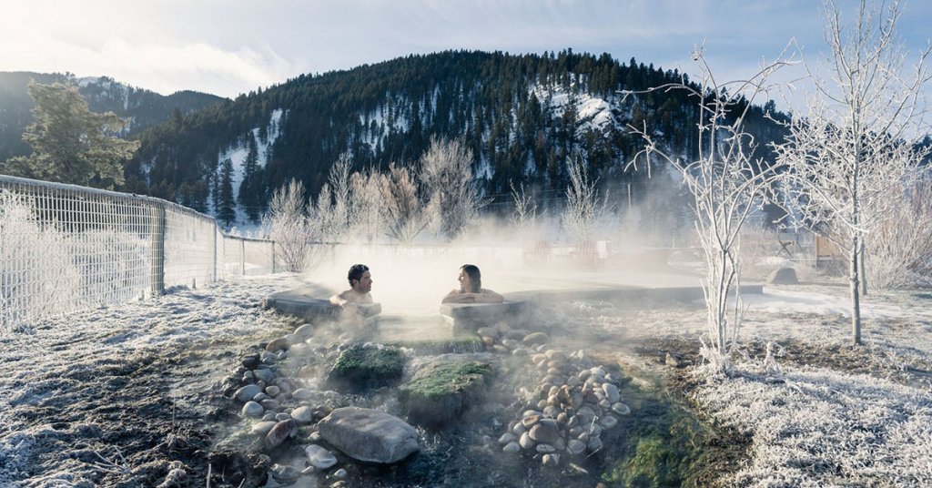 Couple in a Astoria Hot Springs pool, a popular destination in Wyoming.