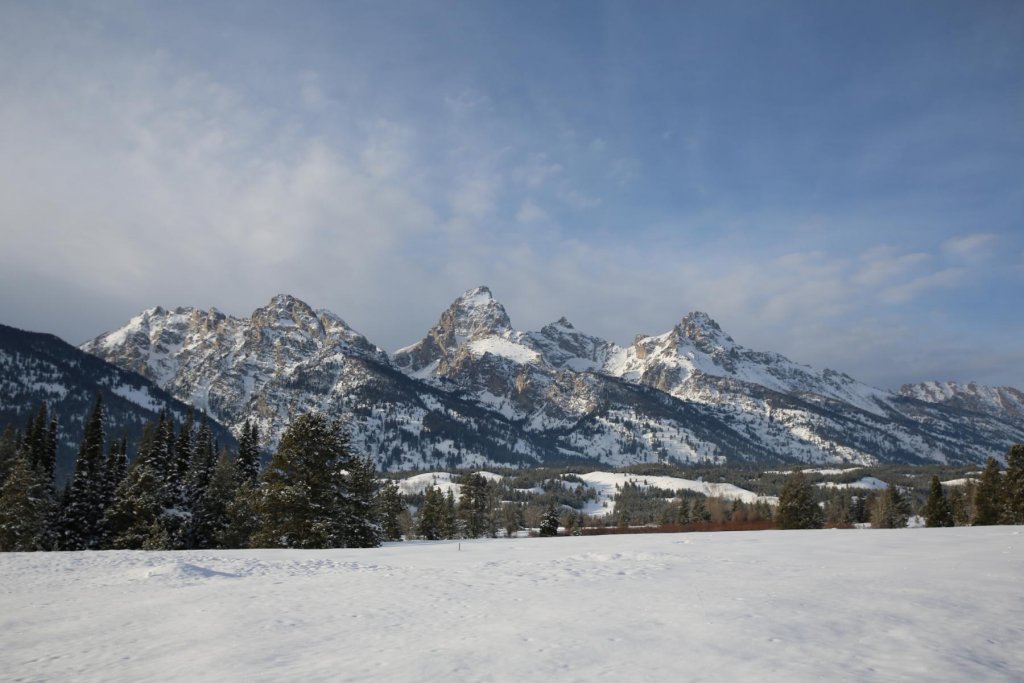 Grand Teton National Park, a popular winter road trip destination, blanketed in snow.