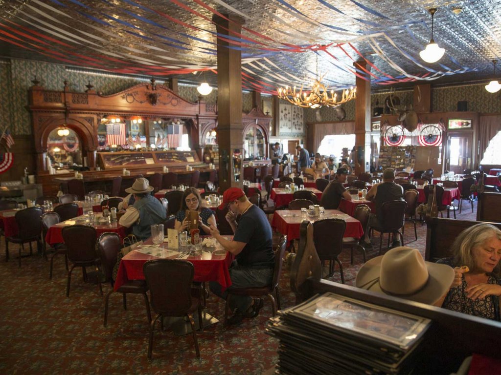 The inside of the Irma Hotel, a famous destination for lodging near Yellowstone.