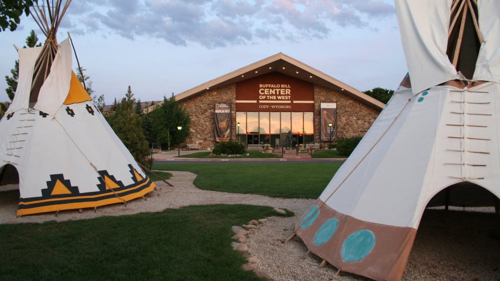 Buffalo Bill Center of the West, one of the best things to do in Cody, WY, with teepees in front.