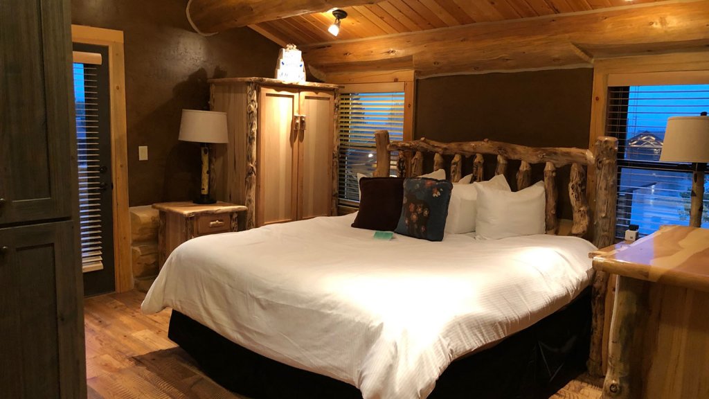 A cozy and rustic hotel room at the Kodiak Mountain Resort is just one of many things to do in Star Valley, WY.