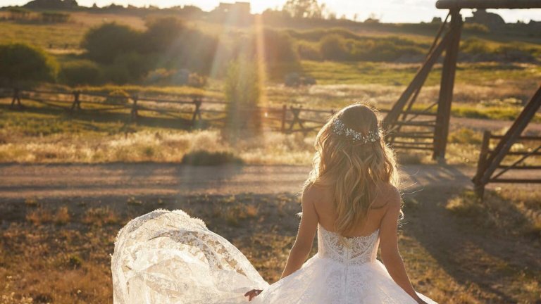 Bride standing outside at a ranch