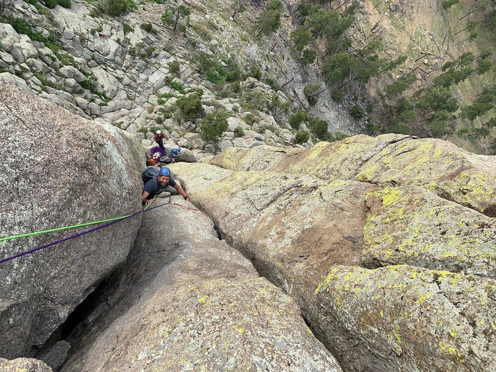 Climbers go rock-climbing at Devils Tower, one of the best things to do near the National Monument.