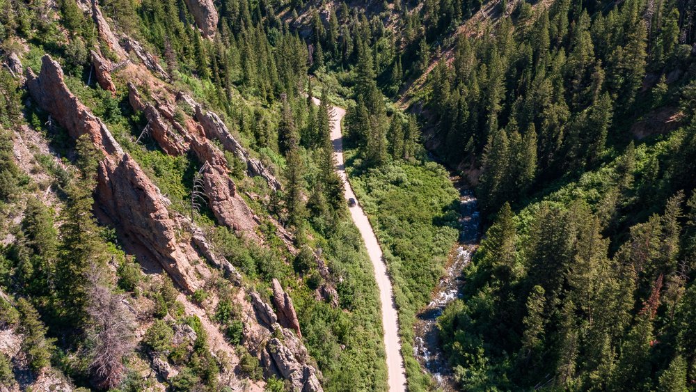 aerial view of a road and trees in the Bridger Teton National Forest, a campground destination