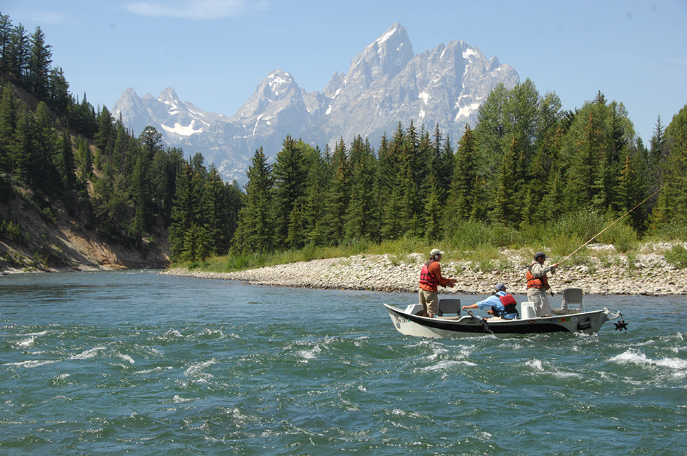 Group of people on a boat fishing in Wyoming