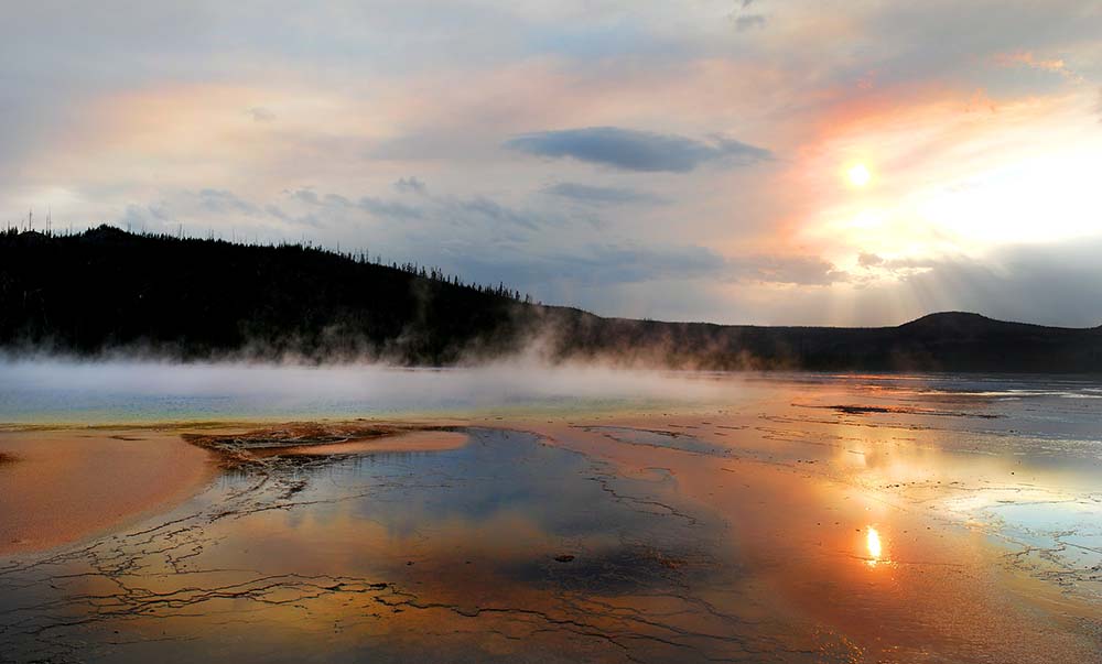 sunset over Yellowstone's hydrothermal features.