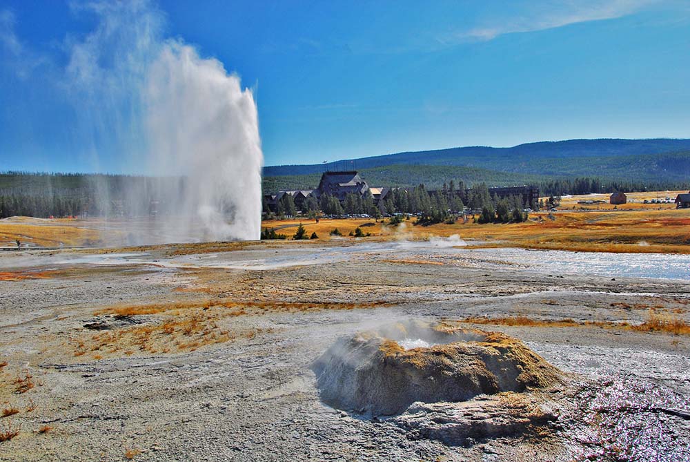 water bursting out of ground at Yellowstone National Park