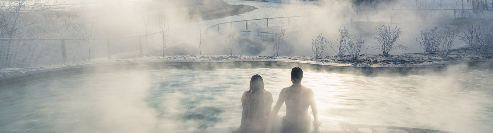 two bathers in a natural hot spring