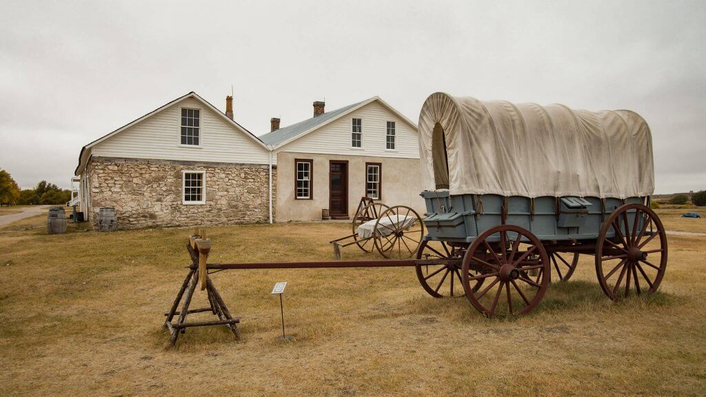 An old wagon sits outside Fort Laramie, a historic site in Wyoming.