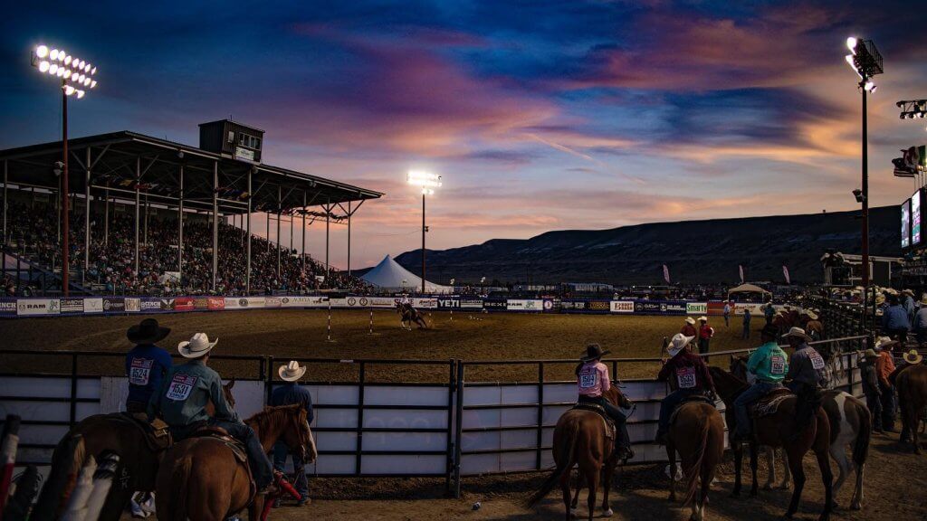 Cowboys gather around the rodeo in Rock Springs, one of the best activities for families.