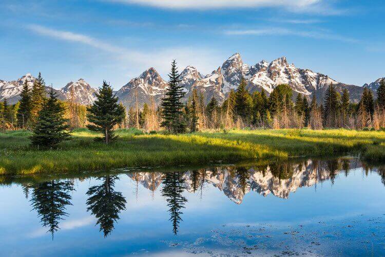 Pristine body of water at Schwabacher Landing offering breath-taking views of the Grand Tetons is one of the best things to do for families.